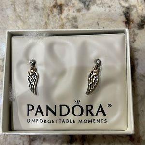 Brand new in box Pandora Angel Wing earrings.